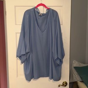 Blue flowy top. Never worn but no tags!